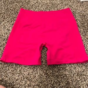 Alphalete Amplify Short 4.5” in the color Pink; size medium
